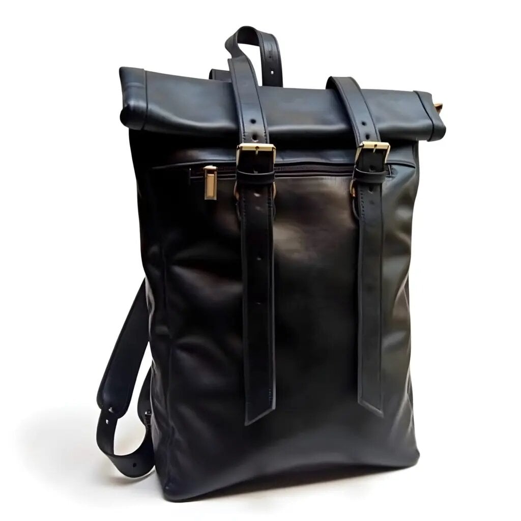 Black leather rolltop backpack with solid brass buckle straps and front zip pocket on white background