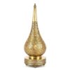 Teardrop brass table lamp with hand-engraved filigree floral patterns on decorative perforated base against white backgr Teardrop brass table lamp with hand-engraved filigree floral patterns on decorative perforated base against white background