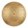 Round brass wall sconce with hand-pierced arabesque and floral medallion pattern illuminated showing warm golden glow on white background