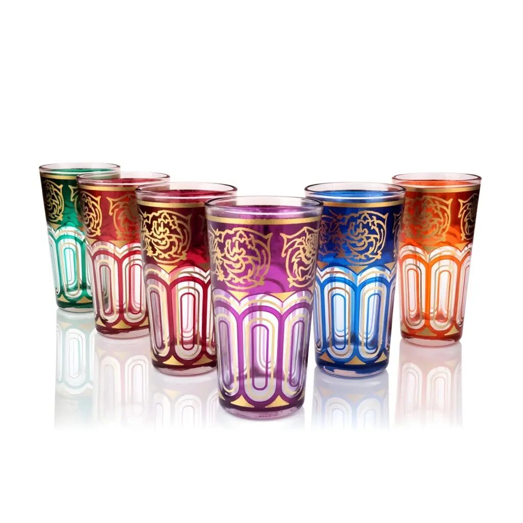 Set of six hand-painted gold arabesque tea glasses in jewel tones arranged on a white surface Set of six hand-painted gold arabesque tea glasses in jewel tones arranged on a white surface