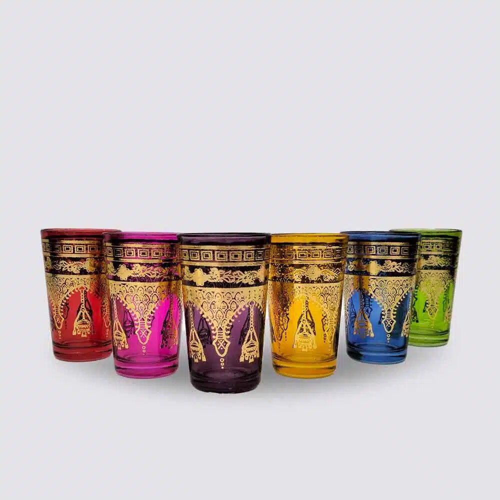 Six multicolor golden henna tea glasses with hand-painted gold motifs on a white background Six multicolor golden henna tea glasses with hand-painted gold motifs on a white background