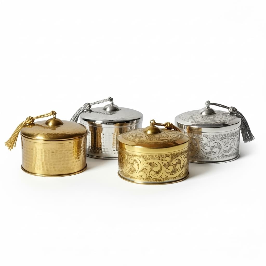 Complete set of decorative metal boxes - one large brass gold and one small silver with engraved patterns Complete set of decorative metal boxes - one large brass gold and one small silver with engraved patterns