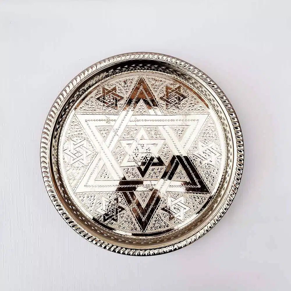 Hand-engraved Star of David on silver-plated brass serving tray with geometric borders and rope-twist rim Hand-engraved Star of David on silver-plated brass serving tray with geometric borders and rope-twist rim