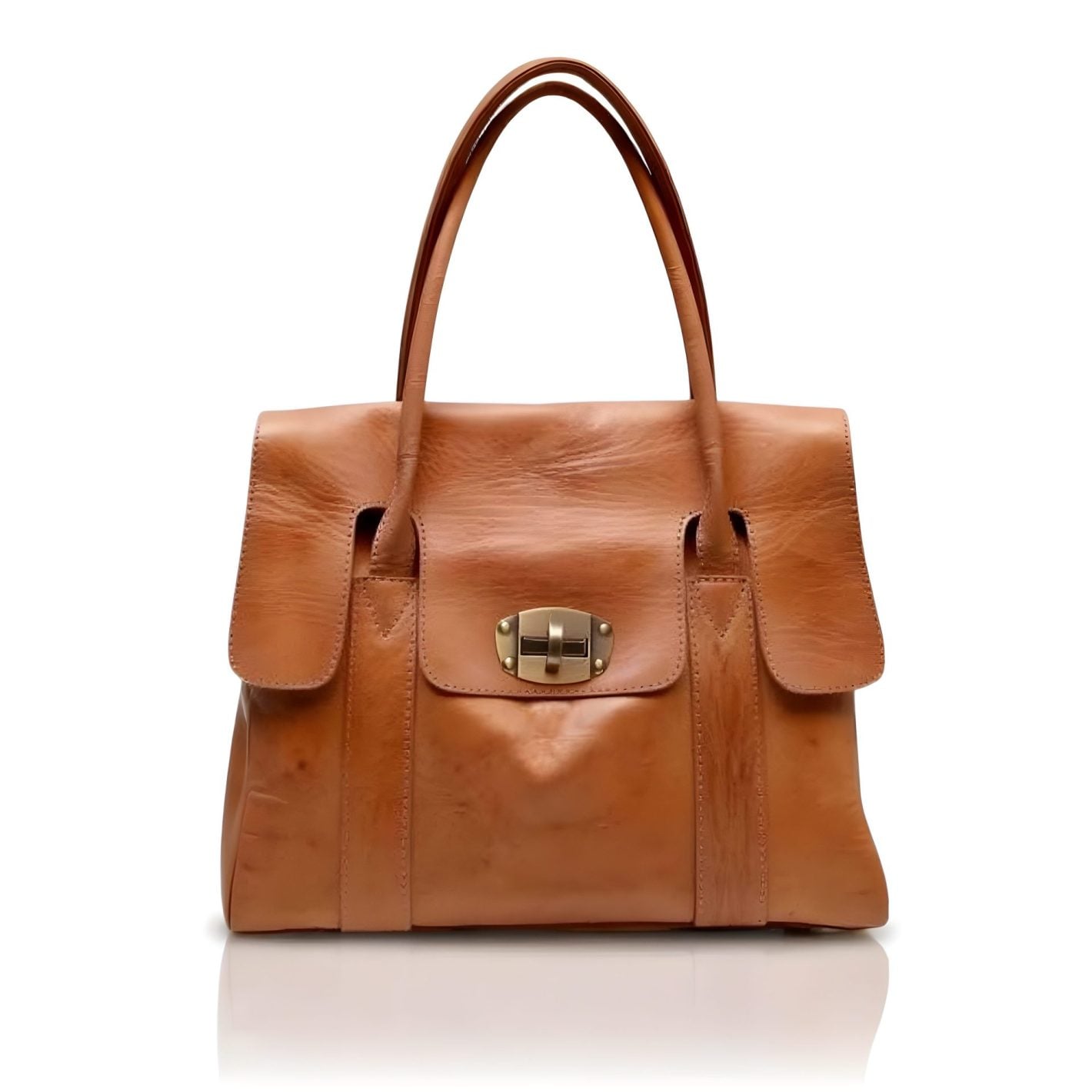 Handcrafted cognac leather tote bag with brass turn-lock closure on white background