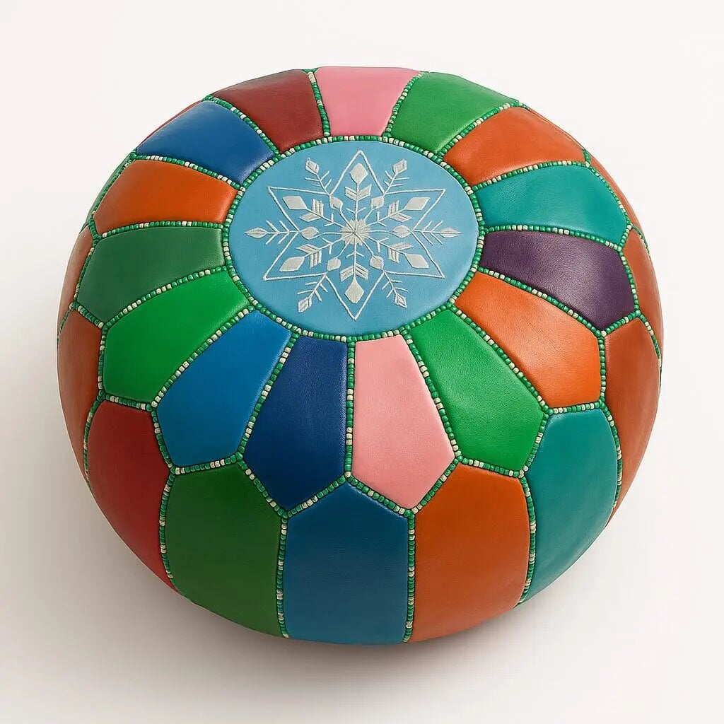 Rainbow patchwork leather floor ottoman with snowflake medallion and metallic beaded seams on white background
