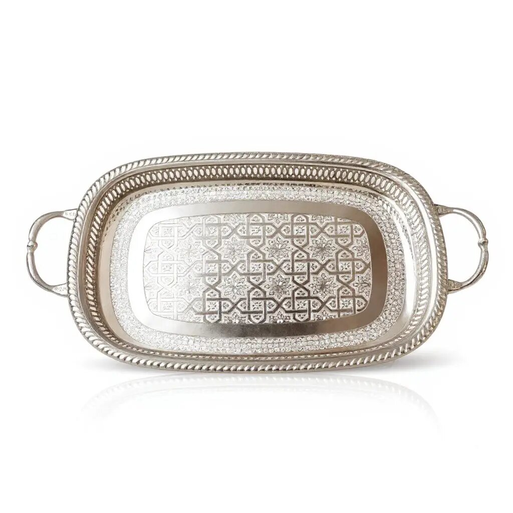 Hand engraved silver oval serving tray with geometric pattern and dual ornate handles, top-down studio view Hand engraved silver oval serving tray with geometric pattern and dual ornate handles, top-down studio view