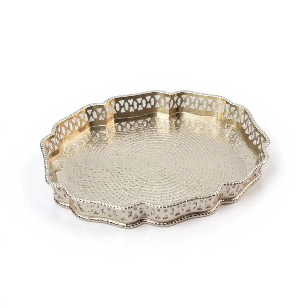 Hand-hammered oval silver serving tray with ornate pierced filigree border, front view on white Hand-hammered oval silver serving tray with ornate pierced filigree border, front view on white