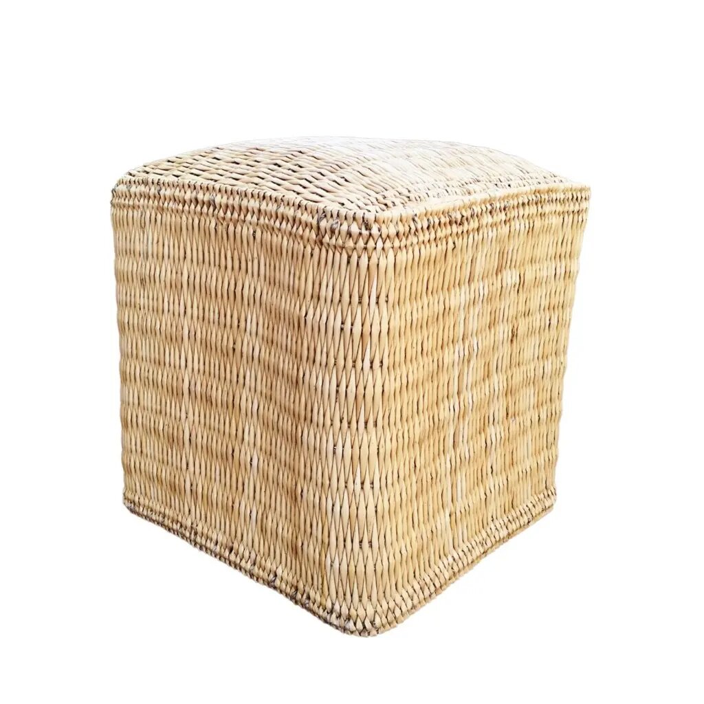 Handmade square straw ottoman pouf with natural finish displayed on white background Handmade square straw ottoman pouf with natural finish displayed on white background