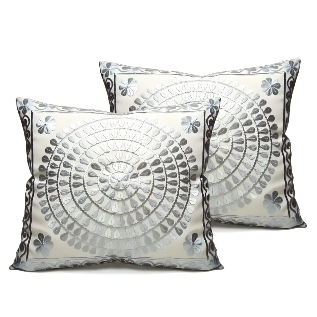 Gray spiral medallion embroidered cotton pillow covers set on white background with dimensional appliqué