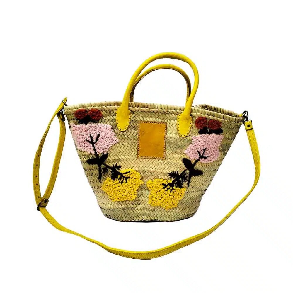 Straw crossbody bag with hand-embroidered flowers and yellow leather handles