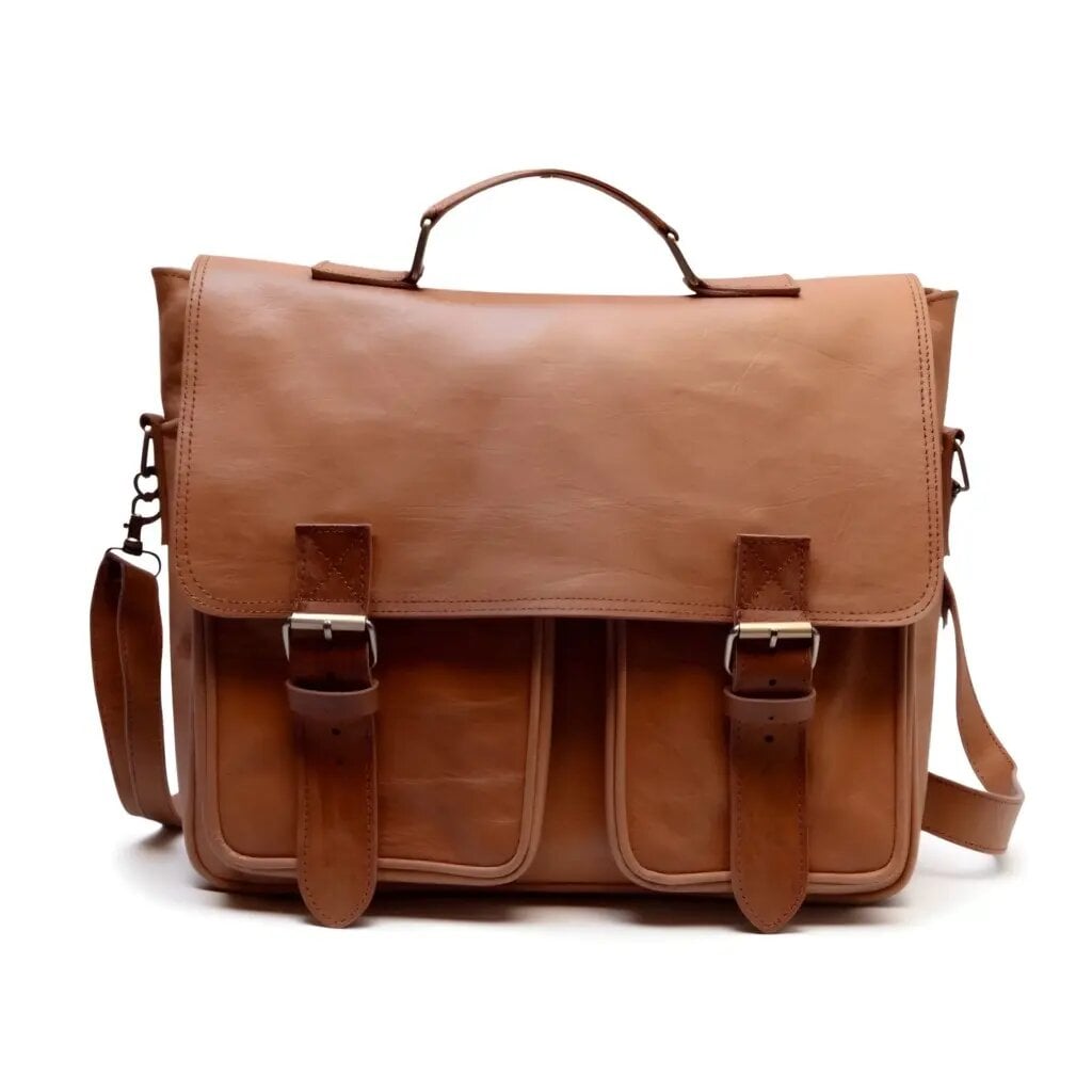 Handcrafted mens leather shoulder bag in tan with brass buckle closures, front flap, and two exterior pockets