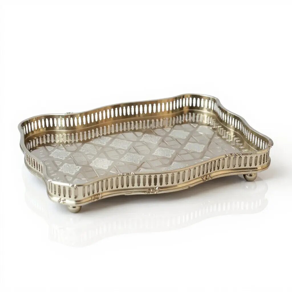 Rectangular silver gallery serving tray with hand-engraved lattice base, pierced slatted edges, and four ball feet Rectangular silver gallery serving tray with hand-engraved lattice base, pierced slatted edges, and four ball feet