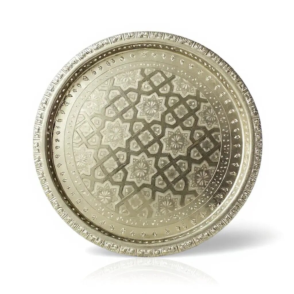Round silver tray with feet featuring hand-engraved geometric mandala center and pierced rim