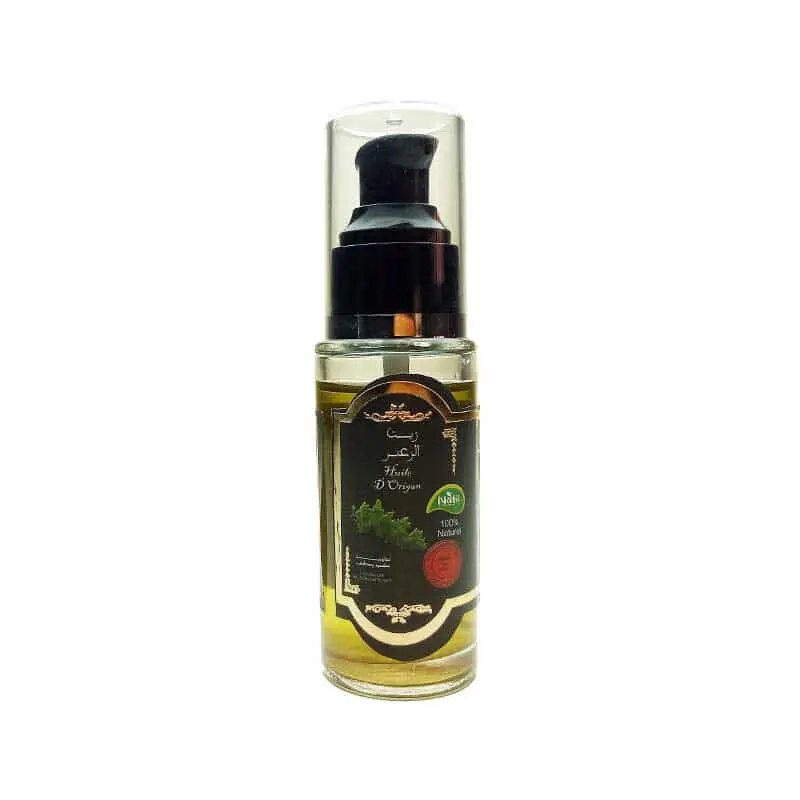 Pure organic thyme oil 50ml in clear glass bottle with black pump dispenser, golden yellow natural essential oil