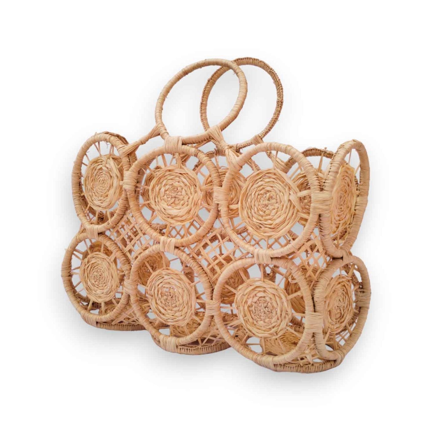 Handwoven raffia tote bag with circular medallion rosettes and arched handles, natural beige raffia Handwoven raffia tote bag with circular medallion rosettes and arched handles, natural beige raffia