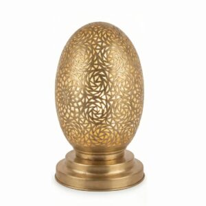 Single brass oval table lamp with egg-shaped shade displaying intricate hand-carved rose vortex design Single brass oval table lamp with egg-shaped shade displaying intricate hand-carved rose vortex design