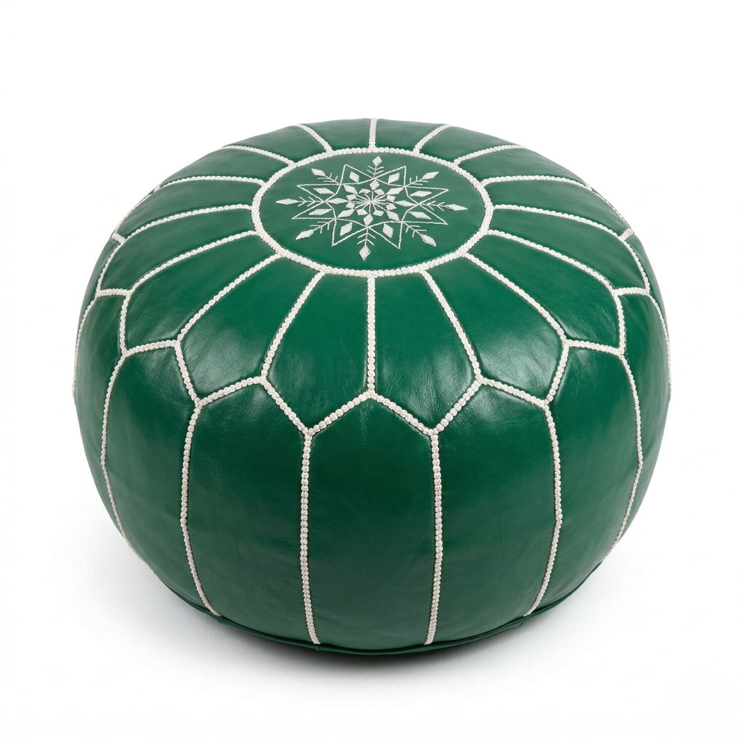 Handcrafted green leather round pouf with white star embroidery on a white studio background Handcrafted green leather round pouf with white star embroidery on a white studio background