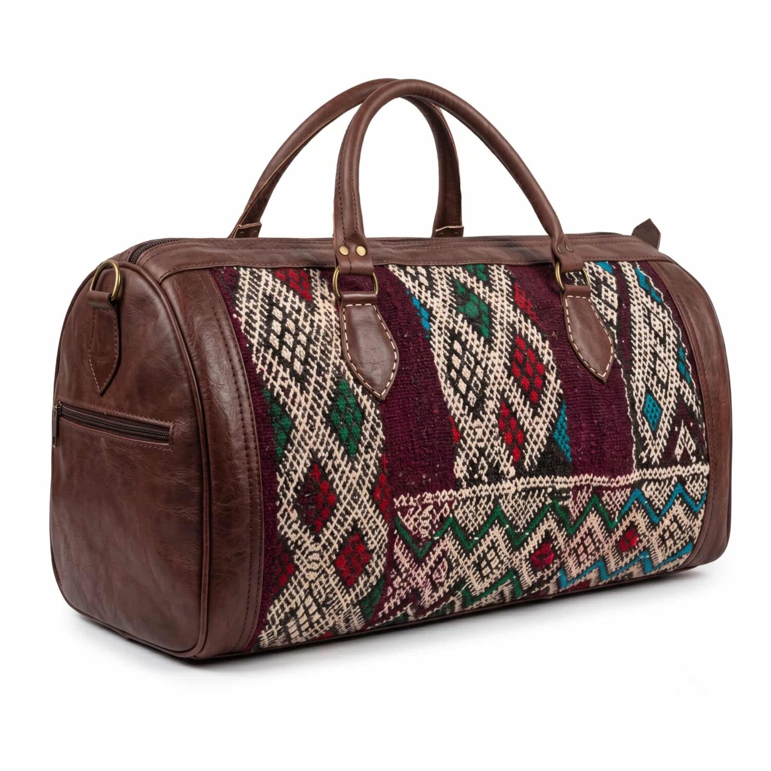 Kilim leather duffle bag main product photo on white background with soft shadow, brown full-grain leather frame and handwoven wool center panel