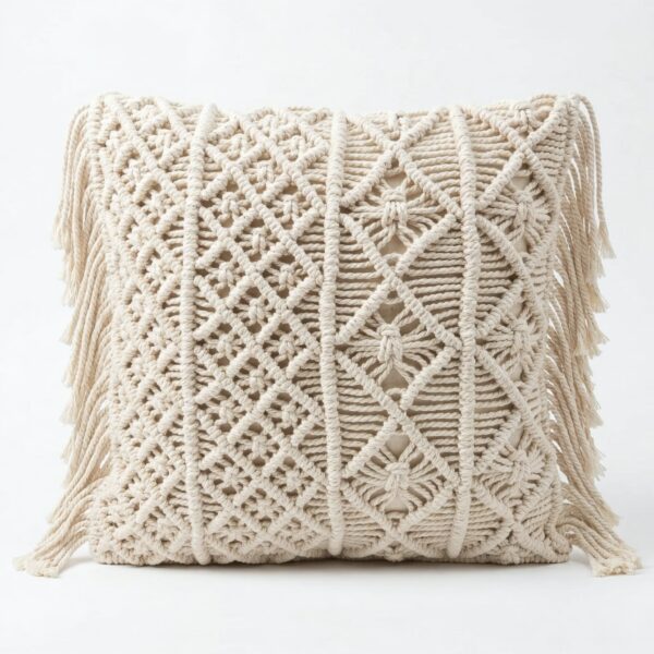 Cream macrame cushion cover featuring intricate diamond and leaf knotwork patterns with decorative side fringe tassels Cream macrame cushion cover featuring intricate diamond and leaf knotwork patterns with decorative side fringe tassels