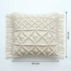 Macrame cushion cover flat lay showing 40cm by 40cm dimensions with hand-knotted geometric cotton pattern and fringe edg Macrame cushion cover flat lay showing 40cm by 40cm dimensions with hand-knotted geometric cotton pattern and fringe edges