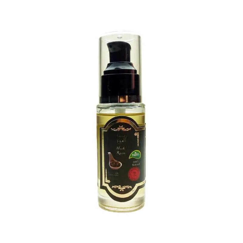 Organic castor oil 50ml bottle with black pump dispenser, golden cold-pressed oil in elegant glass container