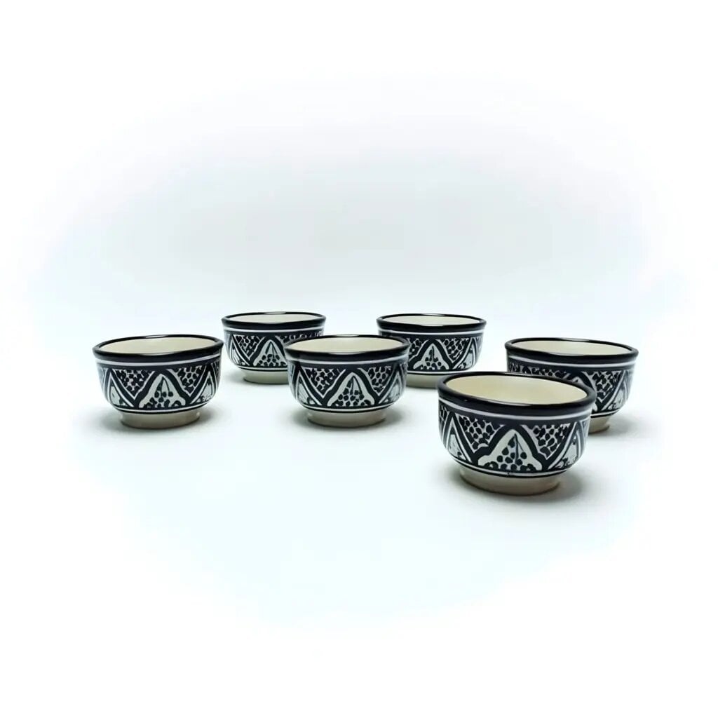 Set of 6 hand-painted ceramic serving bowls with black Zwak geometric patterns on white background Set of 6 hand-painted ceramic serving bowls with black Zwak geometric patterns on white background
