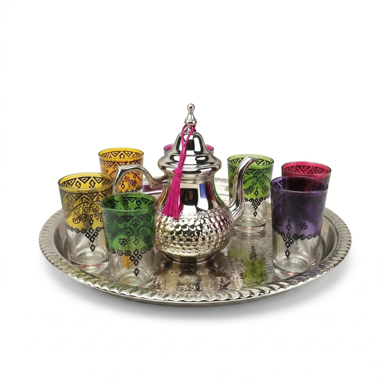 Hand-hammered silver beldi tea set with teapot, six multicolor glasses, and engraved round tray on white background