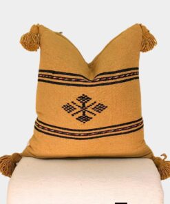 Mustard Moroccan kilim pillow cover with large wool corner tassels and Berber motif