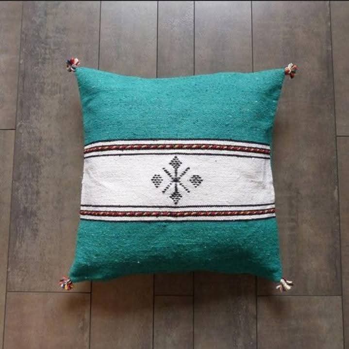 Handwoven Moroccan kilim pillow cover in green with a white central band and Berber motif