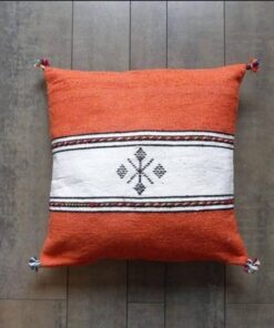 Handwoven Moroccan kilim pillow cover in orange with a white central band and Berber motif