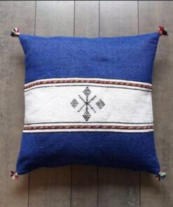 Handwoven Moroccan kilim pillow cover in royal blue with a white central band and Berber motif