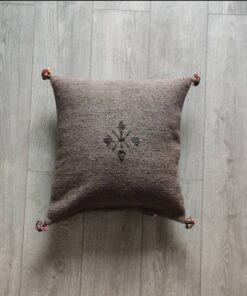 Handwoven Moroccan kilim pillow cover in taupe brown with Berber motif and pompom corners