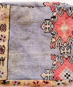 One-of-a-kind vintage Moroccan rug floor pouf in lavender blue with coral medallions and a cream Berber border