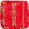 One-of-a-kind vintage Moroccan kilim floor pouf in bright red with ivory and orange zigzag bands