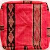 One-of-a-kind vintage Moroccan kilim floor pouf in raspberry red with black bands of pink diamond patterns