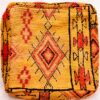 One-of-a-kind vintage Moroccan rug floor pouf in saffron yellow with a red and black central diamond