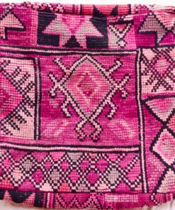 One-of-a-kind vintage Moroccan rug floor pouf in fuchsia and magenta with black and grey Berber diamonds
