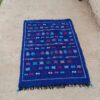 Royal blue handwoven Moroccan kilim rug with colourful Berber symbols