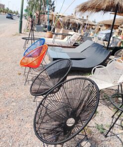Black Oval Acapulco rope chair with sunburst weave