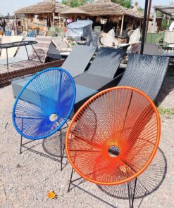 Royal blue and orange Oval Acapulco rope lounge chairs in Marrakech