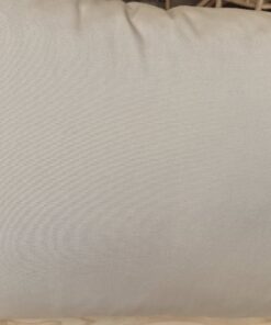 Black and white awning stripe outdoor cushions on a wooden table