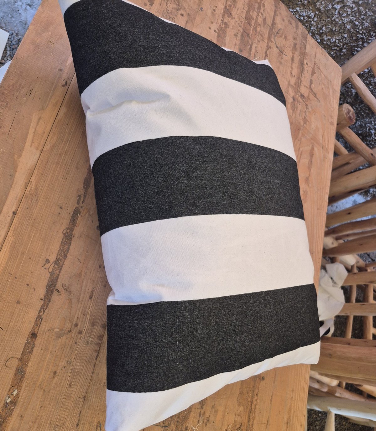 Black and white striped water-resistant outdoor cushion