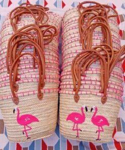 Moroccan straw basket bags embroidered with pink flamingos