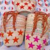 Moroccan straw basket bags embroidered with red, orange and pink stars