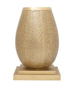 Gold brass pebble table lamp on a stepped square base, unlit, on a white background