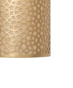 Close-up of the hand-cut geometric star pattern on a brushed brass wall light