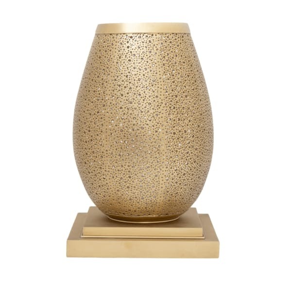 Gold brass pebble table lamp on a stepped square base, unlit, on a white background